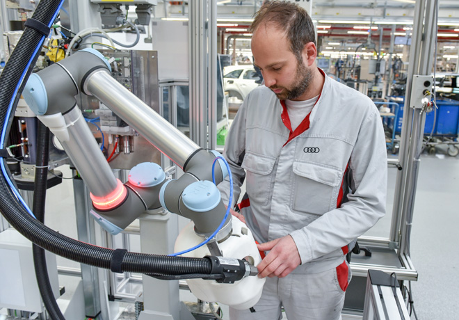 Humanos y robots trabajan cooperativamente en Audi AG